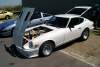 240z with an L28ET swap. custom downpipe, porsche intercooler, xs bov